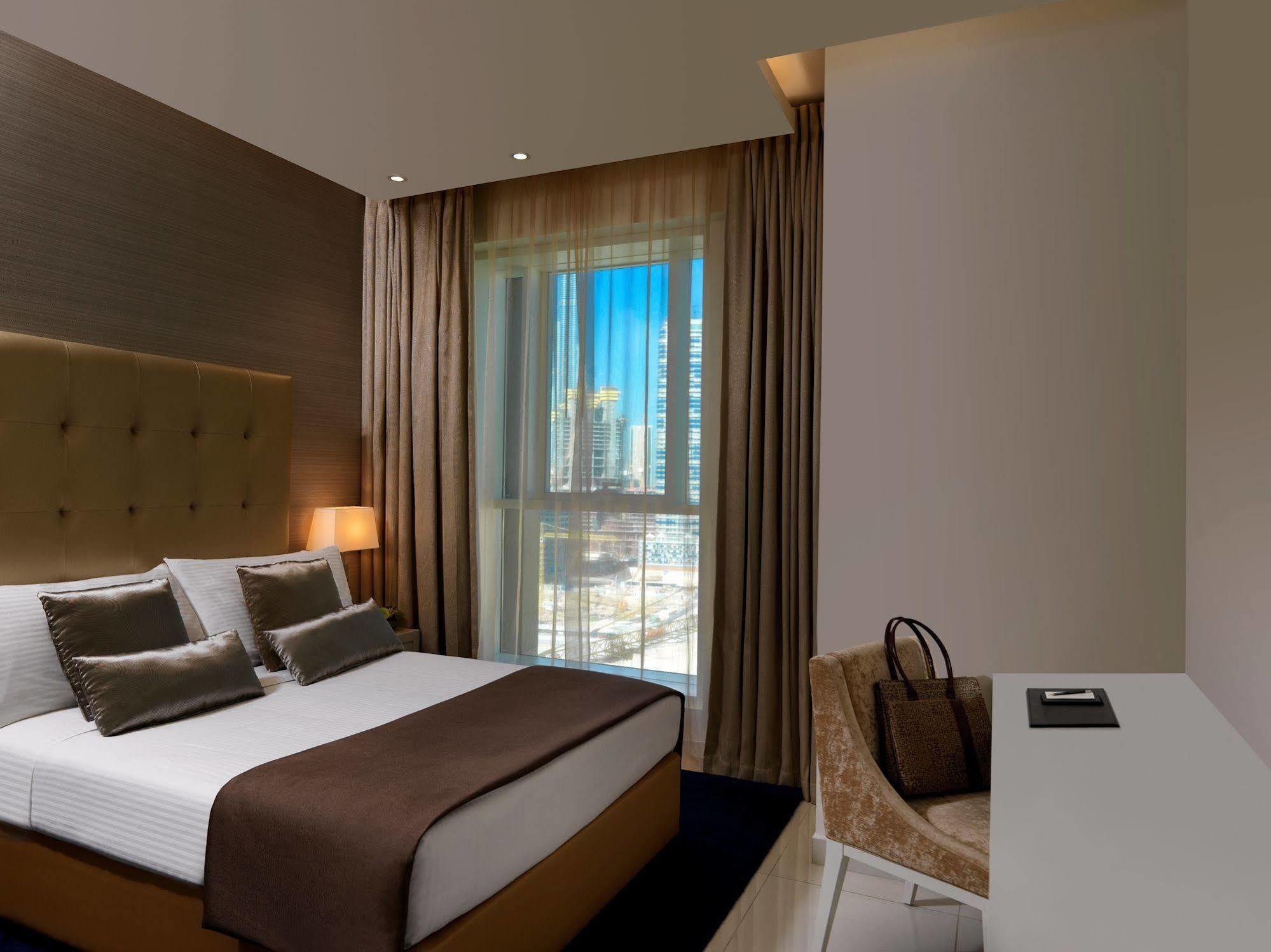 Damac Maison The Vogue 迪拜 外观 照片 A bedroom at the hotel